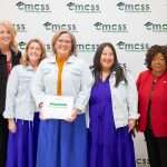 Group of women with point of pride award