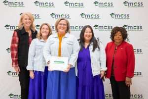 Group of women with point of pride award