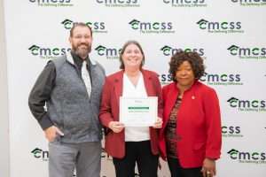 Group of people with point of pride award