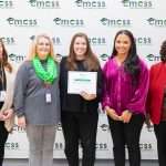 Group of people with point of pride award