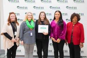 Group of people with point of pride award