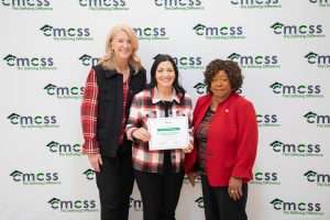 Group of people with point of pride award