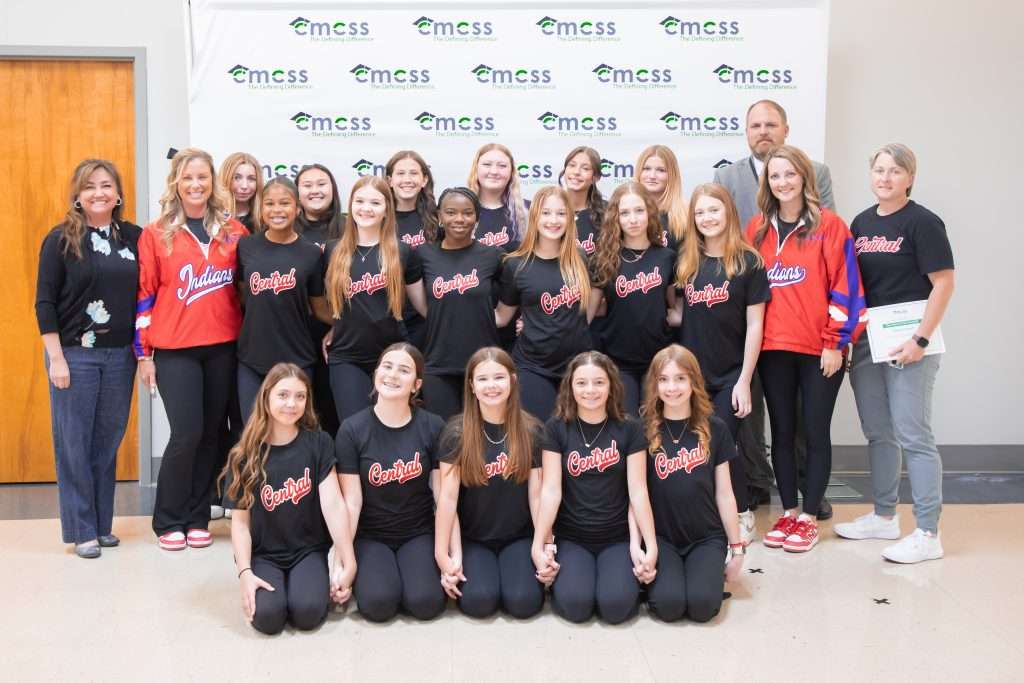 group of middle school girls wearing black shirts